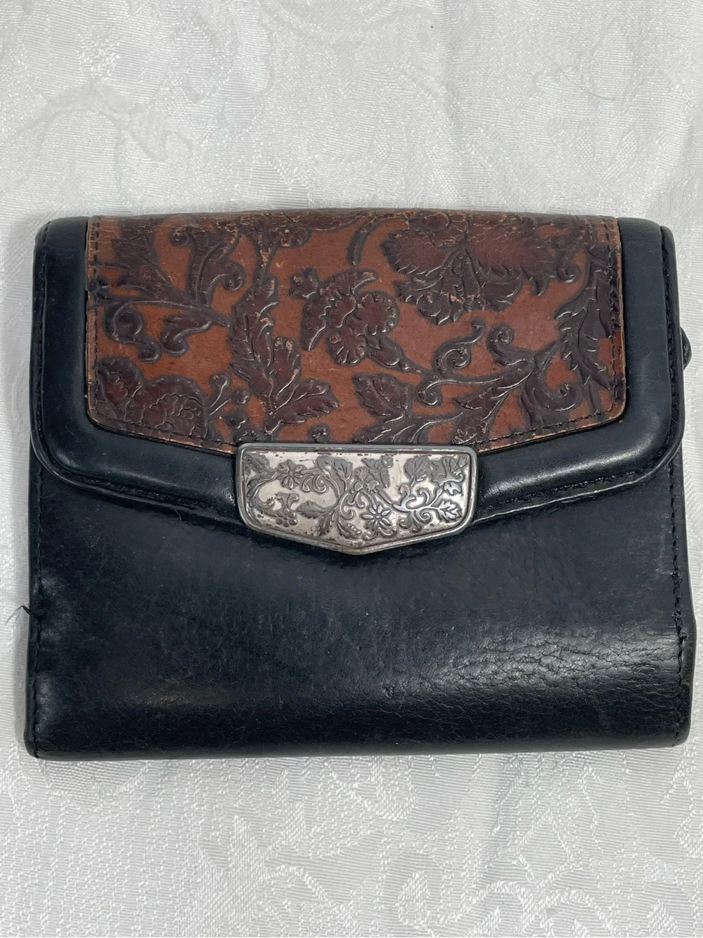 Brighton Vintage Tooled Leather Bifold Wallet in Black and Brown.